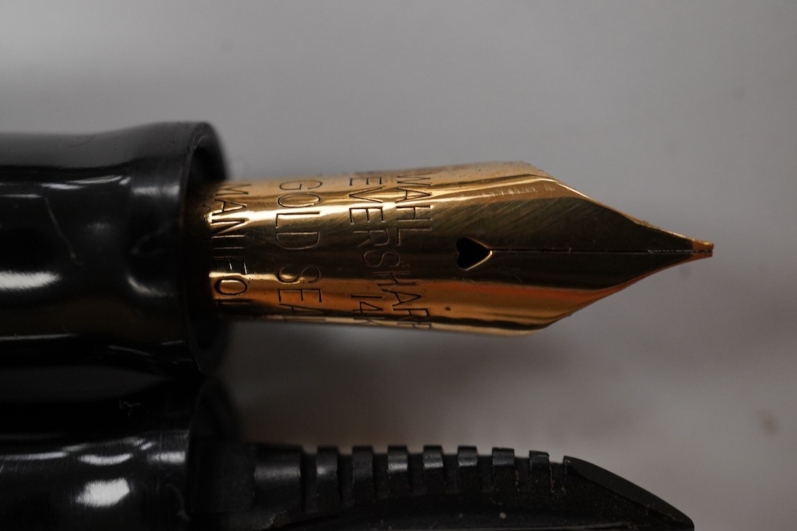 A Wahl Eversharp red hard rubber pen (crack to cap) and two other Wahl pens for spares